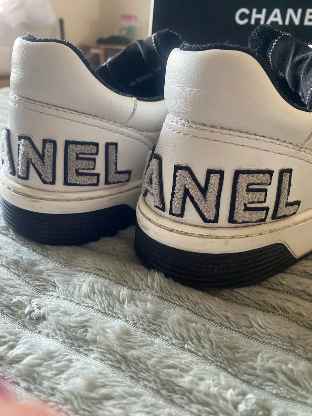 CHANEL White Leather Womens Low-Top Sneakers with Black Accents